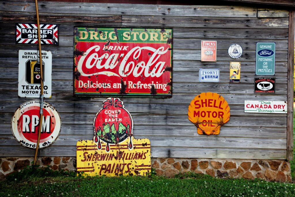 Drug Store Drink Coca Cola Signage on Gray Wooden Wall